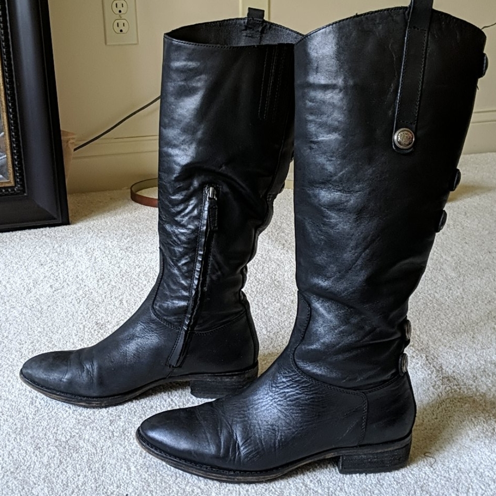Tall leather black boots